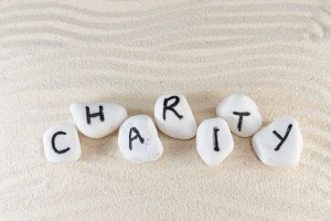 charity-word-charity-in-sand1